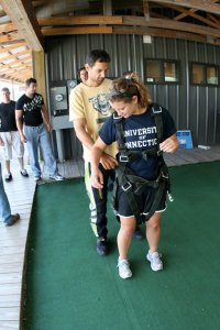 Getting harnessed up by Lars. 